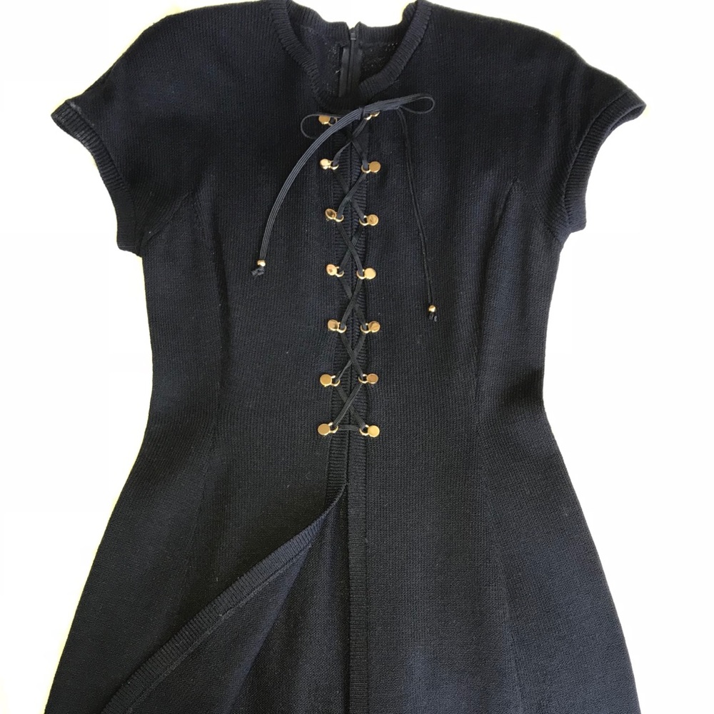 St. John knit cap sleeve tunic with corset detail.